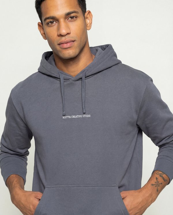 Scotta Creative Studio gray hoodie on model showing on-model photography style