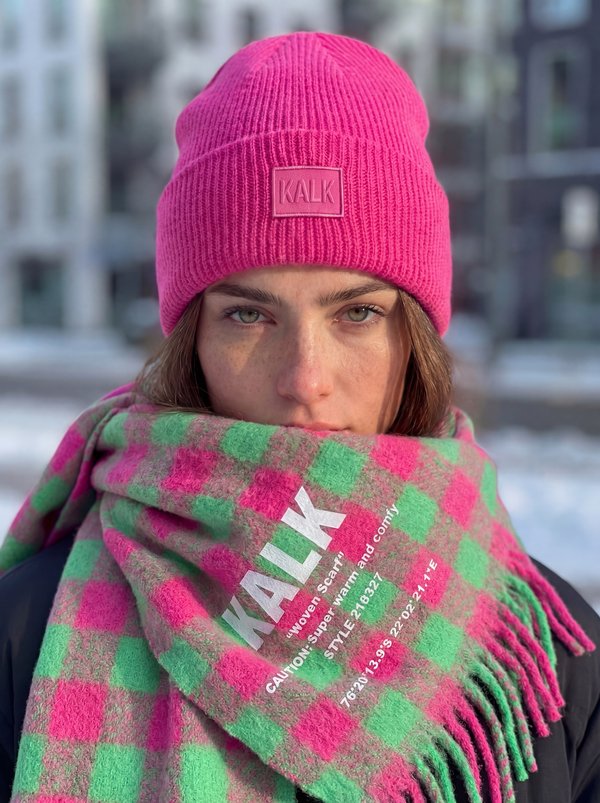 AI photoshoot: woman in hot pink KALK beanie and checkered scarf winter street style