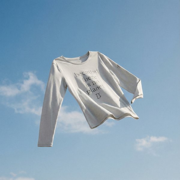 Ecoalf floating white t-shirt against blue sky showing ghost mannequin effect