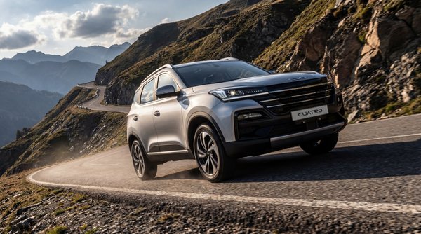 AI product photography: Cuatro SUV on dramatic alpine mountain road