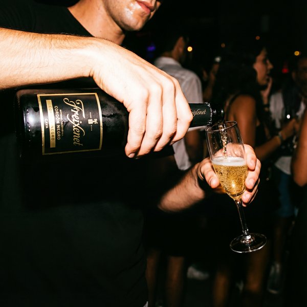 Cuatro SUV on dramatic mountain road with alpine scenery